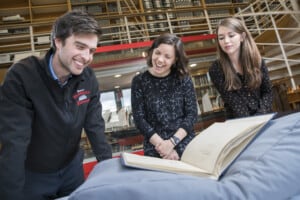 Visitors being shown items in the Brunel Institute at the ss Great Britain.